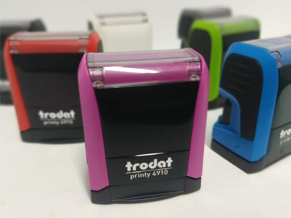 Sello automático Trodat 4910 de cuerpo rosa